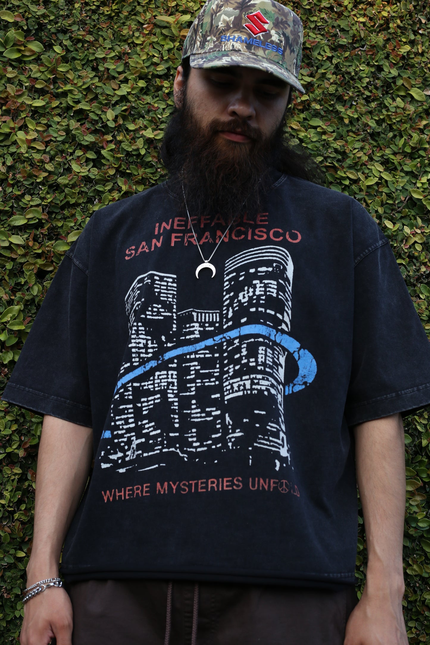 'WHERE MYSTERIES UNFOLD' CROPPED/RAW HEM TEE